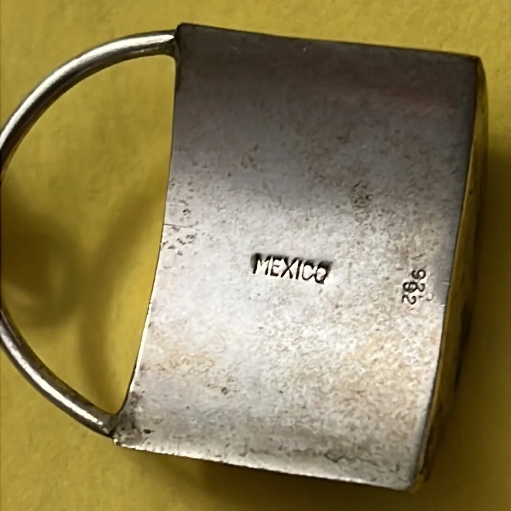 Vintage sterling Mexico pendant. Heavy. Diachronic glass.